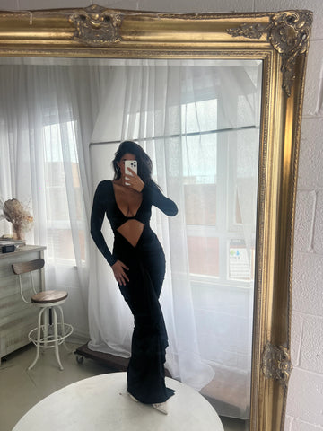 Beautiful model wearing Edano Long Sleeve Gown HIRE (Black), by Amy Taylor Collection. Contact us today to order your perfect outfit. 1